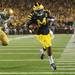Michigan junior running back Vincent Smith runs in the ball for a touchdown around Notre Dame safety Zeke Motta during the fourth quarter against Notre Dame on Saturday. Melanie Maxwell I AnnArbor.com